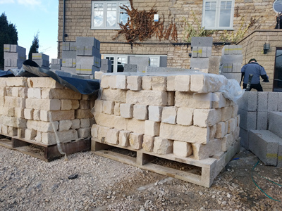 Ext.Day. Pub. Still on the delivery pallets, Natural Stone for the walls.