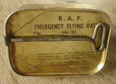 An unopened tin containing Emergency Flying Ration Mk III. Ephemera from World War II